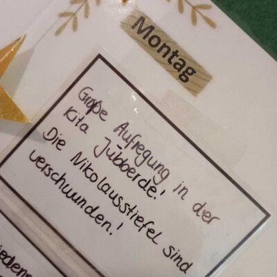 Das Foto zeigt eine Notiz an der Elterninfowand: "Große Aufregung in der Kita Jübberde! Die Nikolausstiefel sind verschwunden!"